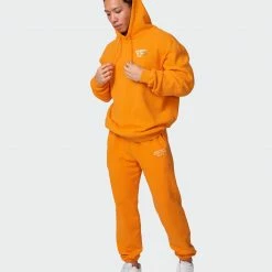 Muscle Nation Mens MN Club Vintage Trackies - Washed Fireball Welcome To The Club