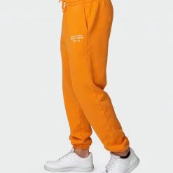 Muscle Nation Mens MN Club Vintage Trackies - Washed Fireball Welcome To The Club