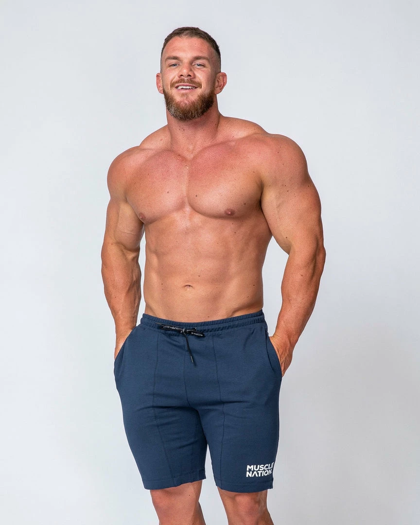 Flash Sale ⌛ Muscle Nation Mens Ultimate Tapered Fit Shorts - Navy 😀 6 Muscle Nation Mens Ultimate Tapered Fit Shorts - Navy