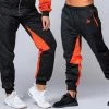 Muscle Nation Unisex Retro Tracksuit Pants - Black / Blood Orange Womens